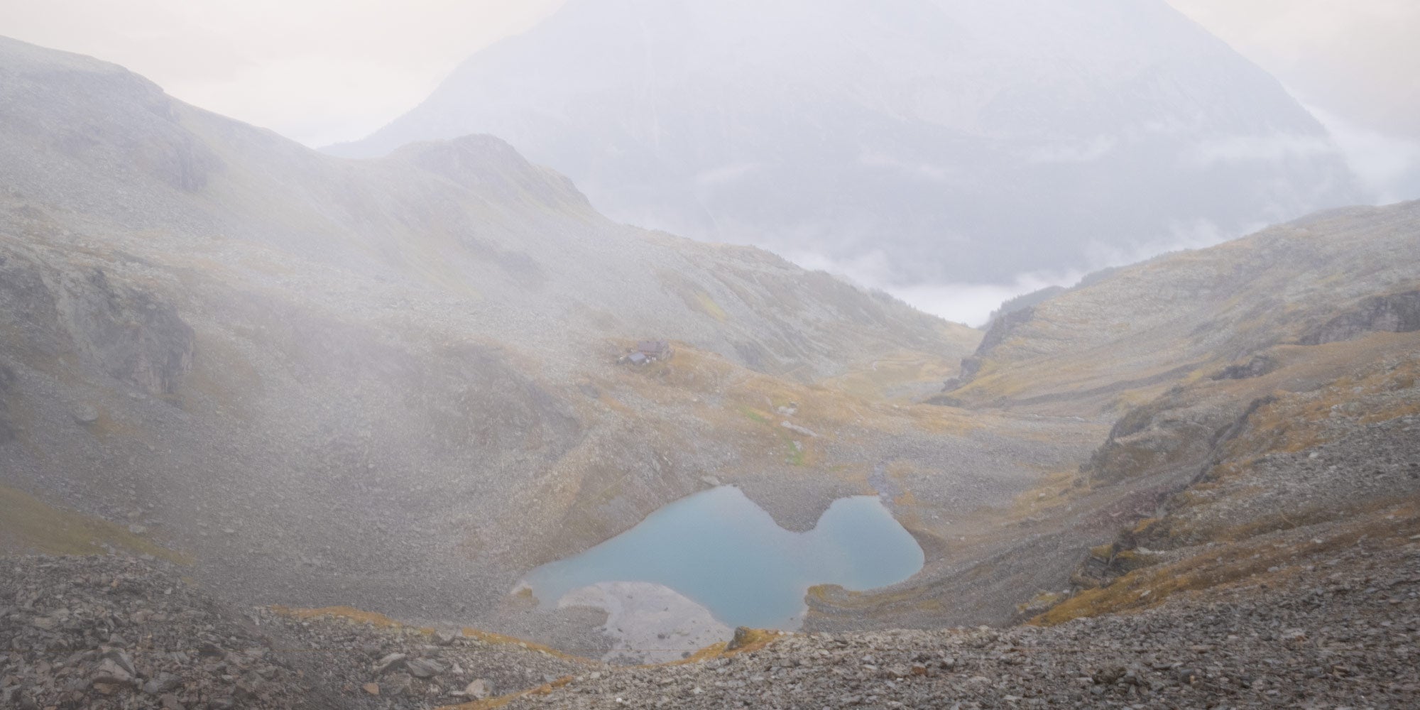 Friesenberghaus in a misty landscape right before descending.